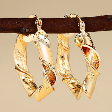 Twisted Cutout Hoop Earrings in Gold-Tone Metal Jewelry