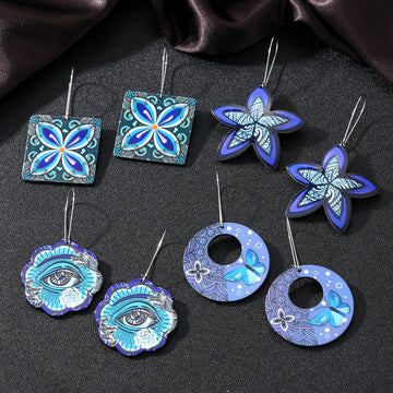 Silver Tone Blue Floral Butterfly and Evil Eye Acrylic Hook Earrings