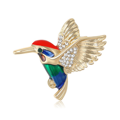 Colorful Enamel Hummingbird Brooch shown against a white display background