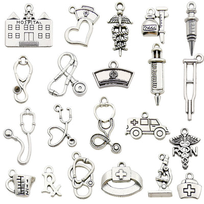 Metallic assorted shape charms arranged on a light background