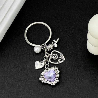 Main display of purple heart rose and leaf charm keychain