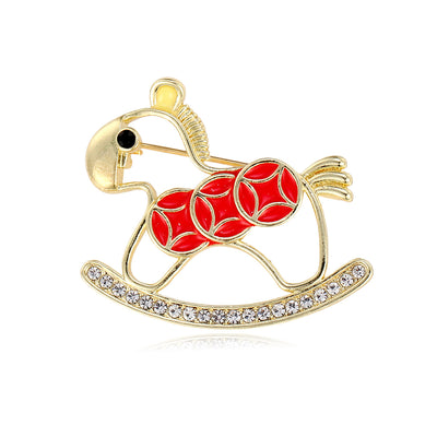 Front product view of the gold rocking horse brooch charm