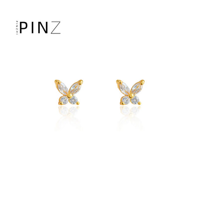 Gold-tone mini butterfly zircon studs on white reflection