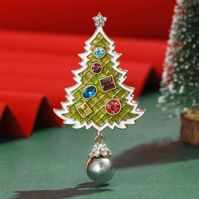 A decorated green Christmas tree with a gray pearl-like drop shown on a white background