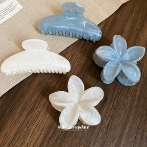 Four Blue And White Marbled Hair Claws In Standard Or Flower Shapes