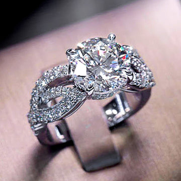 Silver Tone Round CZ Four Prong Twisted Pave Finger Ring