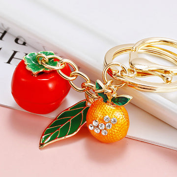 Leaf, Persimmon and Orange Charm Keychains in Three Pictured Colors