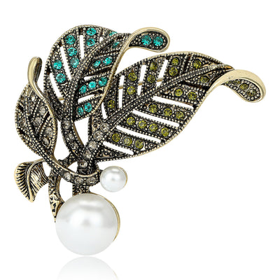 Enamel leaf with pearl drop shown from the front