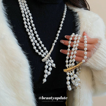 Layered White Pearl Necklace With Asymmetric Pearl Tassel