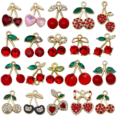 Red cherry charms arranged on a light background