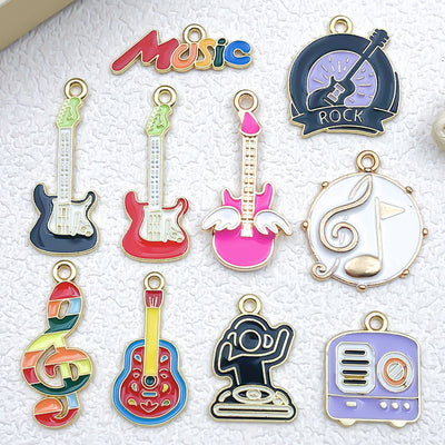 Colorful guitar charms arranged on a light background
