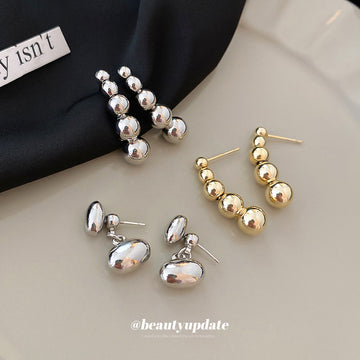 Graduated Silver Tone Metal Ball Drop Stud Earrings