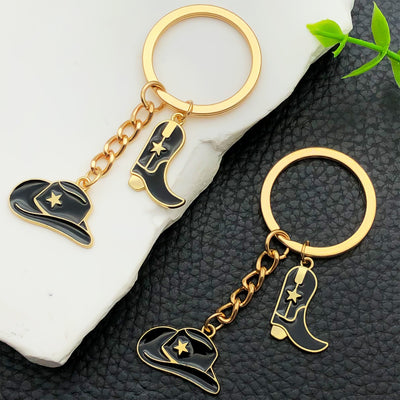 Overview showing the available color and design variations of the black western hat and boot star metal keychain