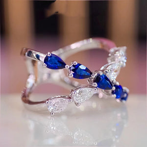 Silver Tone Blue and Clear Marquise Crossover Ring