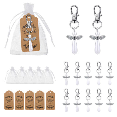 Pearl angel wing keychains with white organza bags and kraft tags
