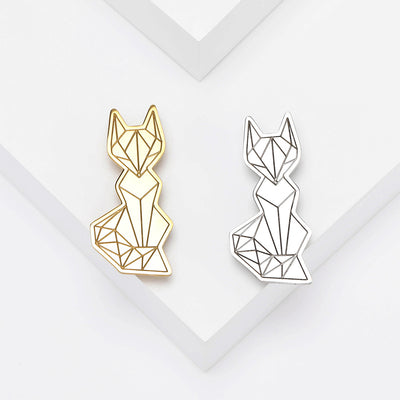 Front view of minimal geometric fox silhouette with a smooth metal finish