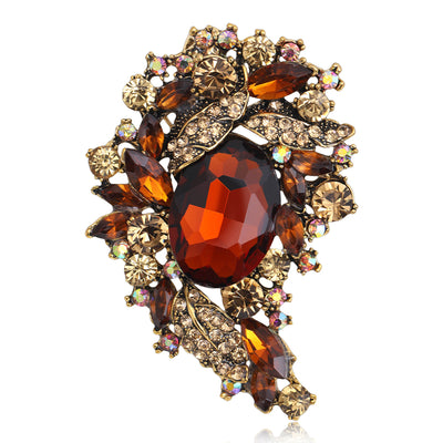 Front view showing the antique gold crystal cluster brooch in six color variations