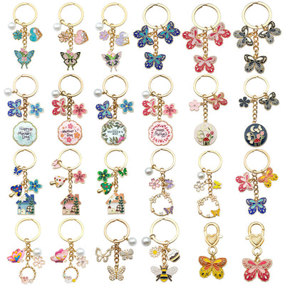 Image 1 showing a set of six different colored butterfly key chains.