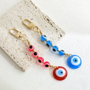 Gold-Tone Evil Eye Bead Keychain With Glass Disc Pendant