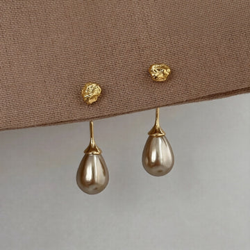 Brown Teardrop Pearl Stud Earrings With Polished Metal Tone Details
