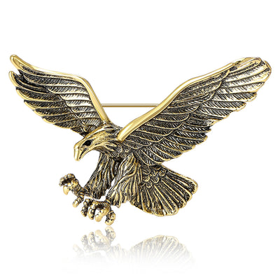 Antique gold eagle brooch front on white