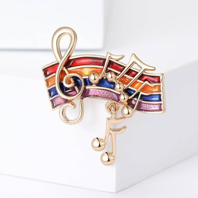 Rainbow Music Notes brooch front view on a white background