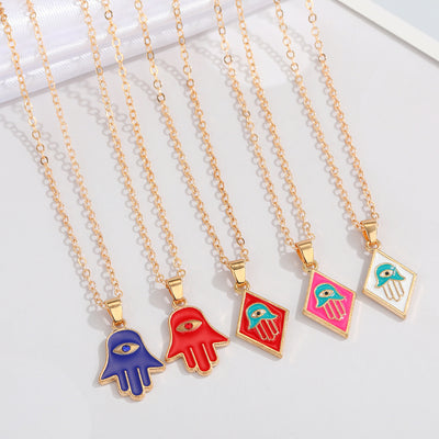 Main product view of gold Tone Enamel Hamsa Evil Eye Pendant Necklaces in Five Designs