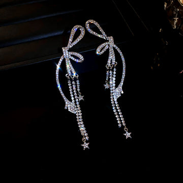 Crystal Bow Statement Earrings in Blue and Silver Tones