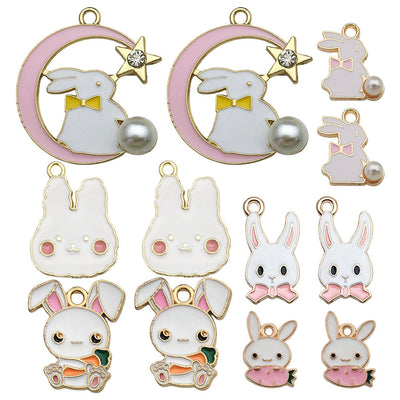Colorful rabbit and moon charms arranged on a light background