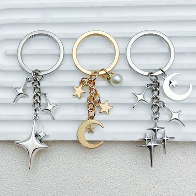 Image 1 showing a set of five different metal key chains.