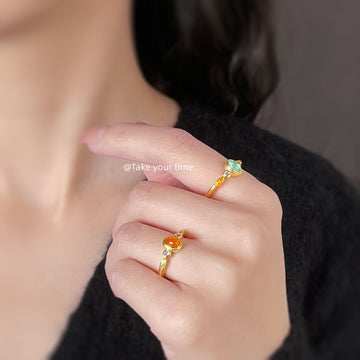 Gold Tone Pale Green Round Stone And Orange Accent Open Ring