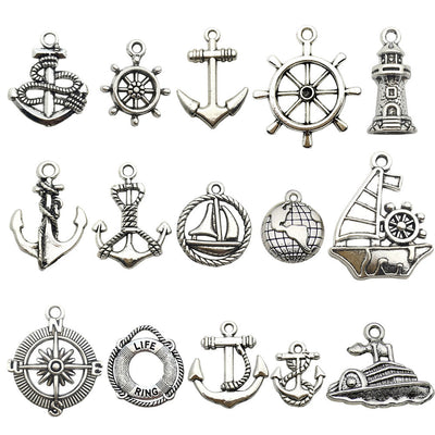 Metallic assorted shape charms arranged on a light background