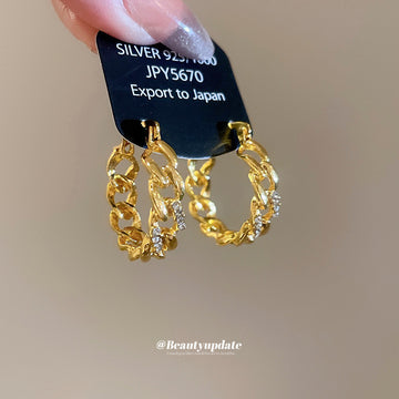 Gold Tone Textured Twisted Openwork Huggie Hoop Earrings