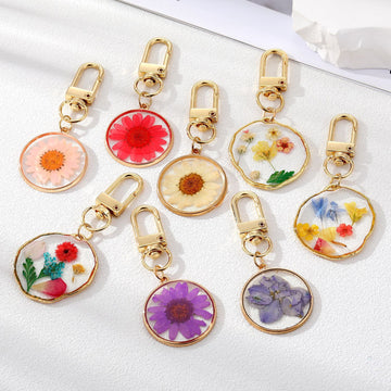 Gold Tone Pressed Flower Resin Clip Keychains in Eight Round and Irregular Designs