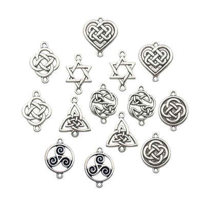 Metallic assorted shape charms arranged on a light background