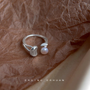 Silver Tone Sculpted Leaf And White Pearl Adjustable Open Ring