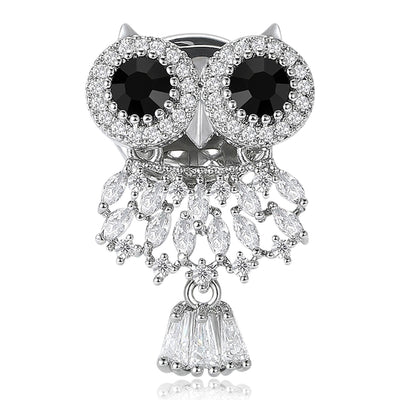 Front view of the black eye crystal owl brooch and its color options