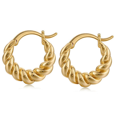 Gold twisted rope hinge hoop earrings pair on white