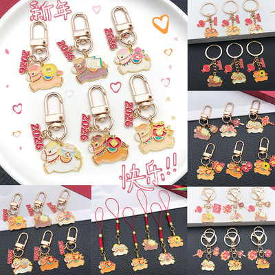 Main display of mixed horse lucky symbol keychains and phone straps