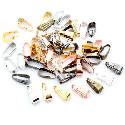 Pinch Bail Pendant Connector Findings in Eight Finishes, grouped overview on a plain background