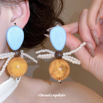 Blue and Amber Bow Drop Earrings with Pearl Strands