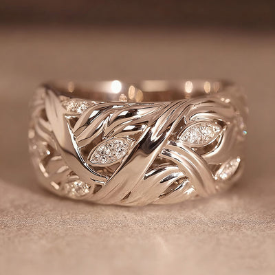 Front silver woven leaf openwork band ring with marquise clear stones