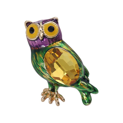 Front view of the faceted crystal owl brooch with enamel wings decorative clothing pin on a white background