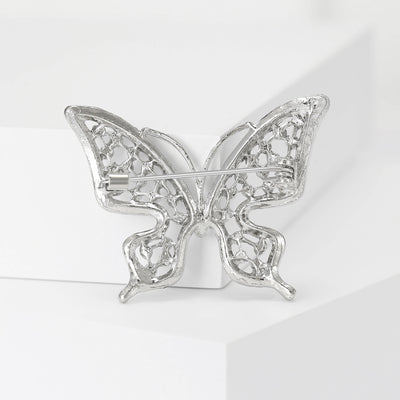 Silver openwork butterfly brooch reverse showing pin clasp and lattice back