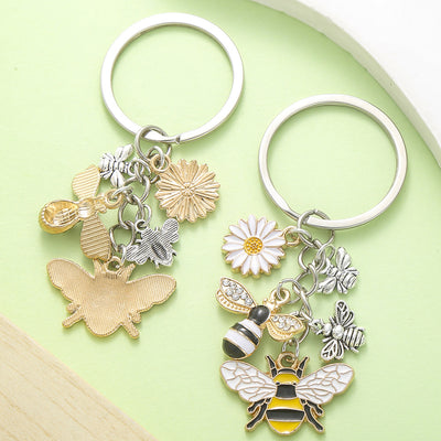 Image 1 showing two key chains with different charms on them.