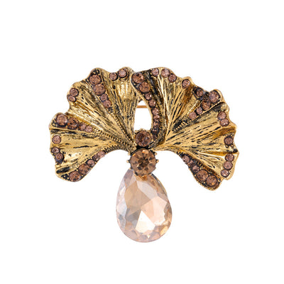 Front product view of the ginkgo leaf brooch pin in gold and red