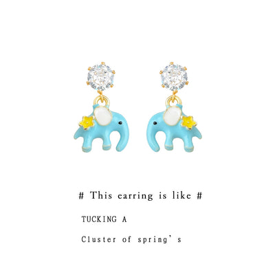 Silver-tone clear-stone blue-elephant yellow-star drops in the first product display.