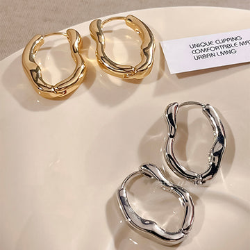 Irregular Sculpted Metal Hoop Earrings in Gold and Silver