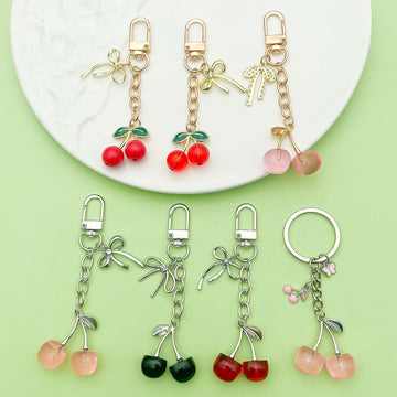 Cherry Charm Keychains Featuring Black Cherry Across 28 Pictured Variations