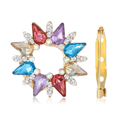 Front view of circular marquise crystal brooch in red multicolor and blue